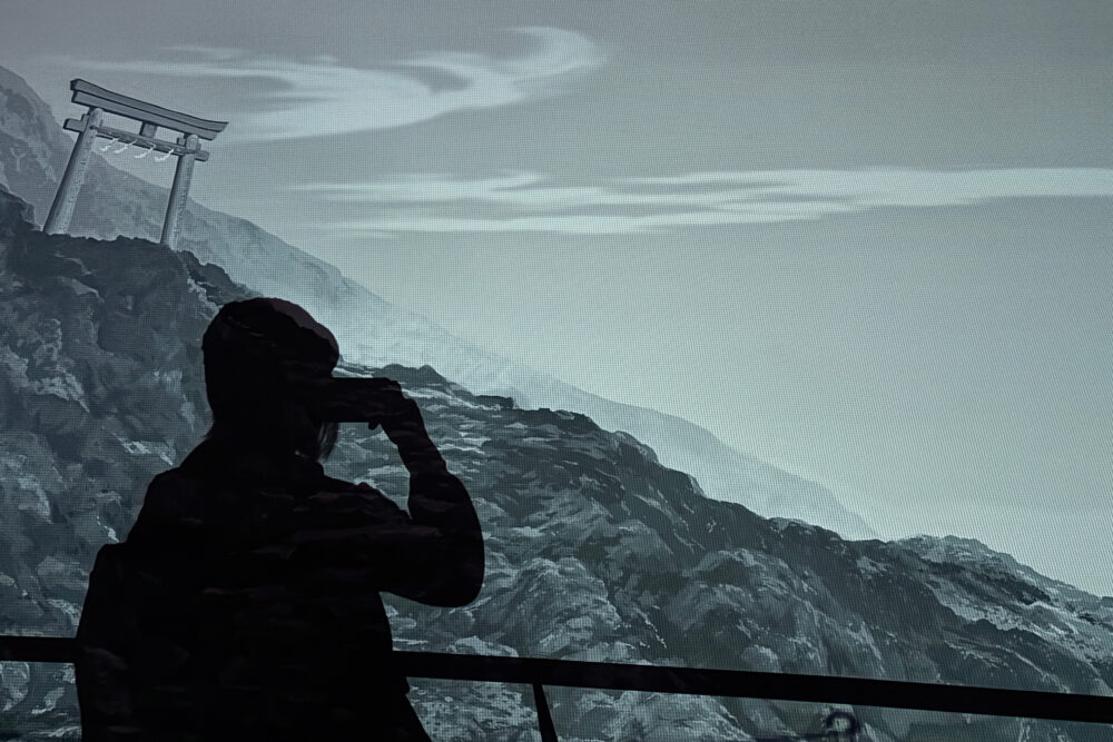 富士山登山の映像に映り込んだ人の影